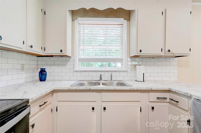 3043 Charles Rd, Shelby, NC 28152 - kitchen featuring a sink, white cabinetry, and tasteful backsplash