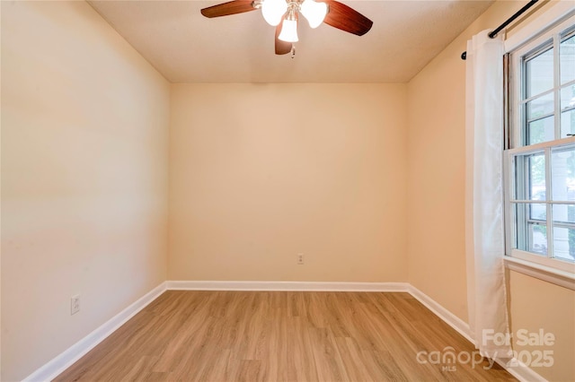 3043 Charles Rd, Shelby, NC 28152 - spare room with light wood finished floors, baseboards, and ceiling fan