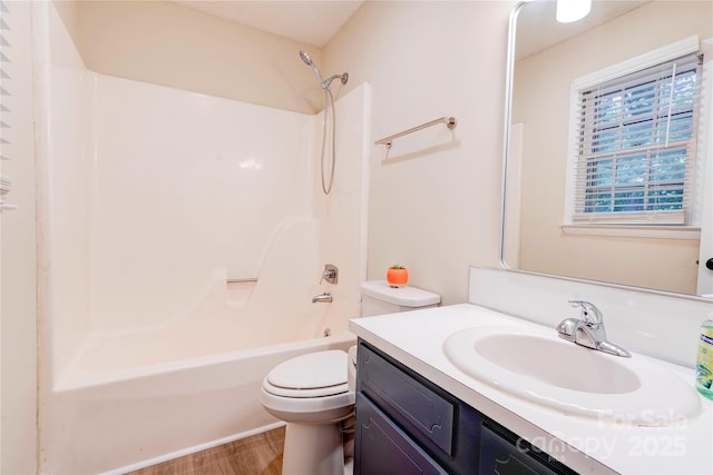 3043 Charles Rd, Shelby, NC 28152 - bathroom with vanity, toilet, shower / bathtub combination, and wood finished floors