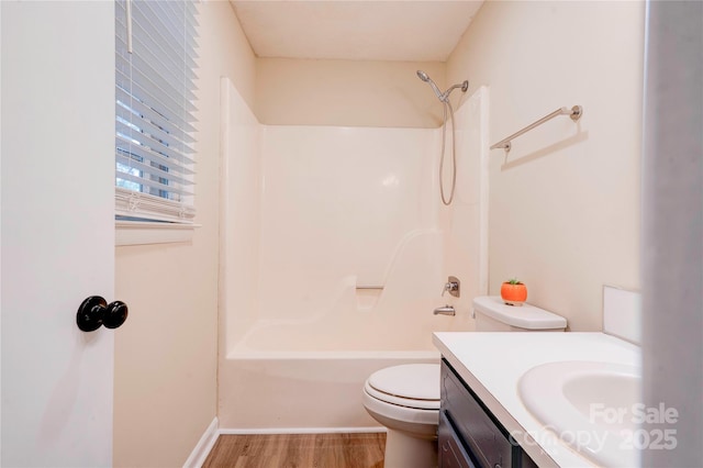 3043 Charles Rd, Shelby, NC 28152 - full bath with toilet, vanity, shower / tub combination, wood finished floors, and baseboards