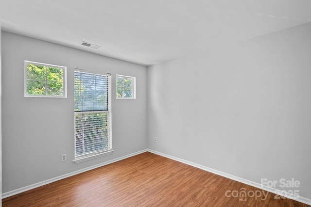 18853 Vineyard Point Ln, Cornelius, NC 28031 - empty room with wood finished floors and baseboards