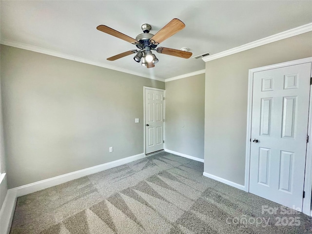 5800 Silver Eagle Dr, Charlotte, NC 28214 - spare room featuring baseboards, crown molding, carpet, and ceiling fan