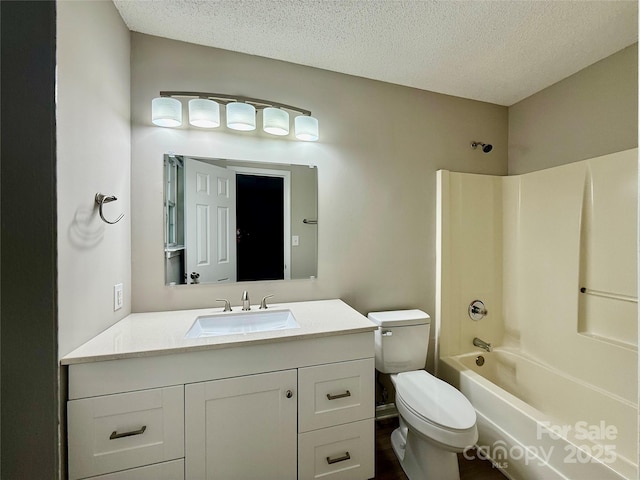 5800 Silver Eagle Dr, Charlotte, NC 28214 - bathroom with a textured ceiling, toilet, vanity, and bathing tub / shower combination
