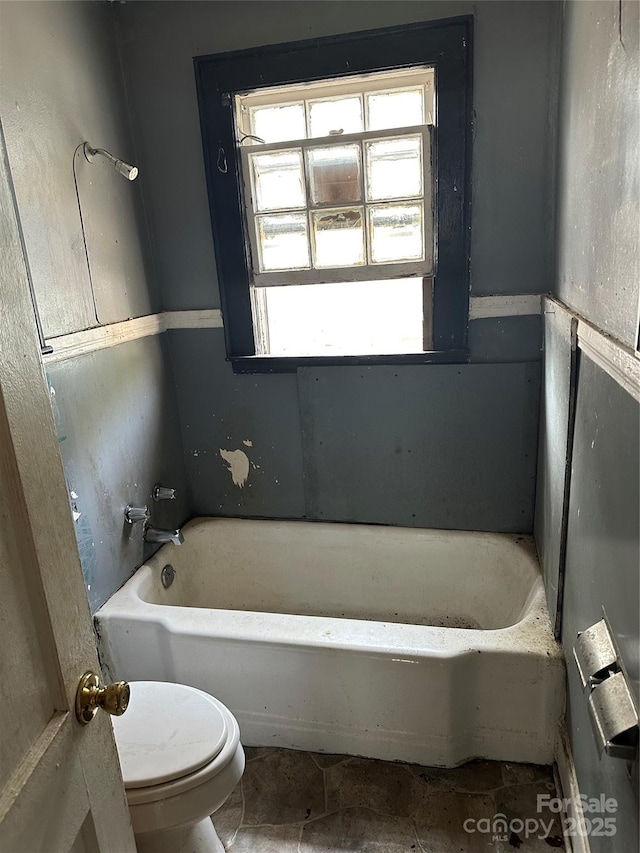 839 S Chester St, Gastonia, NC 28052 - bathroom with healthy amount of natural light, toilet, and a bathtub
