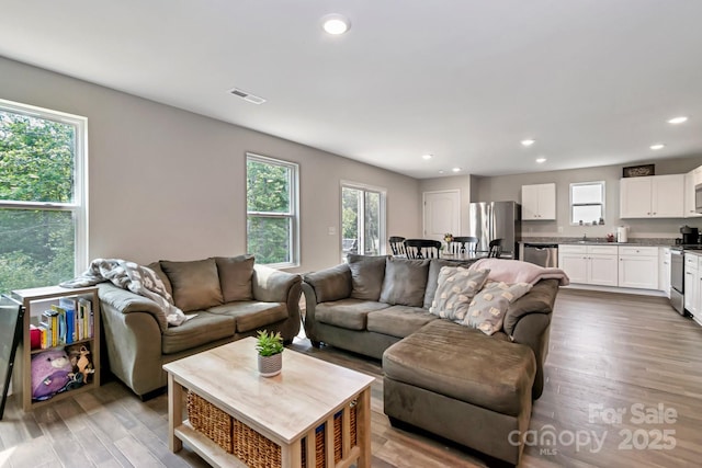 3305 Rian Dr, Lenoir, NC 28645 - living area with recessed lighting and wood finished floors