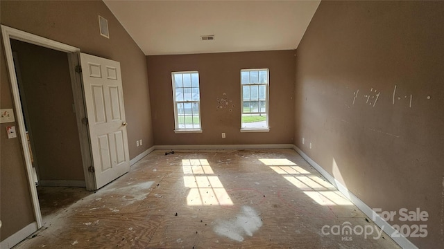 4227 Kiser Woods Dr SW, Concord, NC 28025 - unfurnished bedroom featuring lofted ceiling
