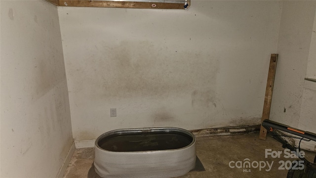 4227 Kiser Woods Dr SW, Concord, NC 28025 - detailed view of unfinished concrete floors