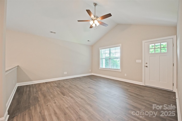 1028 Gibson St, Albemarle, NC 28001 - foyer with ceiling fan, plenty of natural light, vaulted ceiling, and wood finished floors