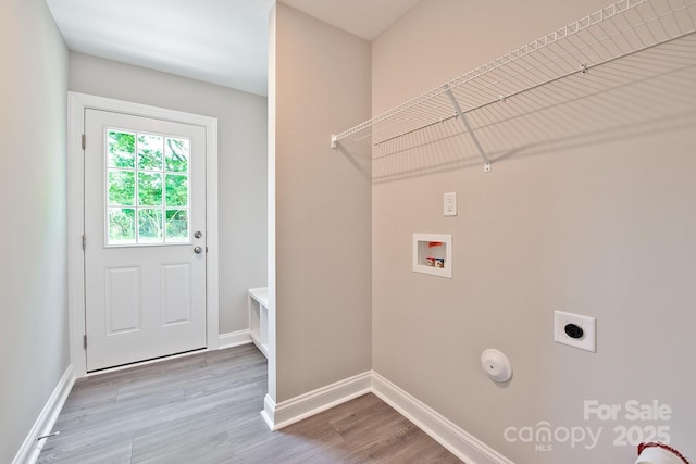 1028 Gibson St, Albemarle, NC 28001 - laundry area featuring washer hookup, electric dryer hookup, baseboards, and wood finished floors