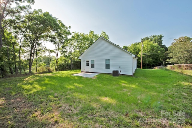 1028 Gibson St, Albemarle, NC 28001 - view of side of property with a lawn and a patio