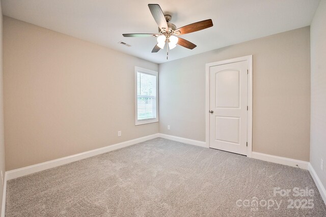 1028 Gibson St, Albemarle, NC 28001 - carpeted empty room with a ceiling fan and baseboards