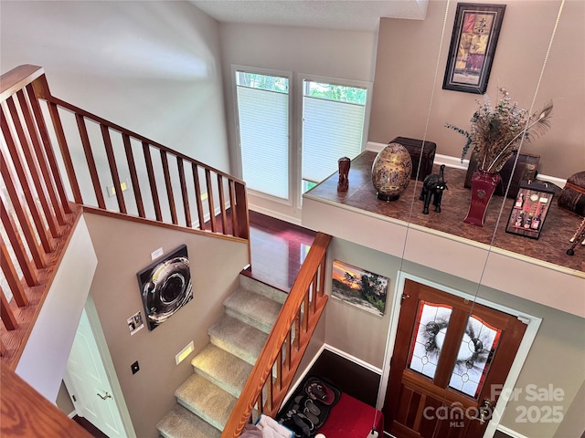 67 Cliffview Dr, Asheville, NC 28803 - stairway featuring baseboards