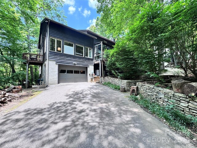 67 Cliffview Dr, Asheville, NC 28803 - view of front of house with asphalt driveway and an attached garage