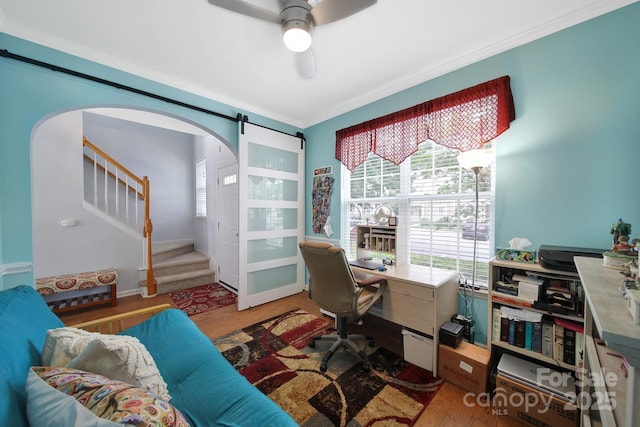 635 Brickdust Ct, Fort Mill, SC 29708 - home office featuring arched walkways, wood finished floors, a ceiling fan, crown molding, and plenty of natural light