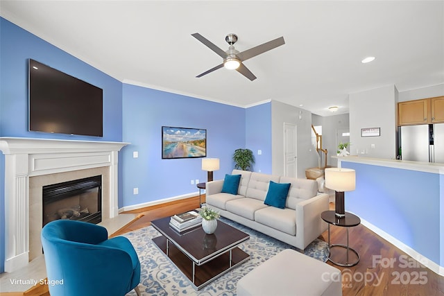 635 Brickdust Ct, Fort Mill, SC 29708 - living area with wood finished floors, a ceiling fan, a fireplace, and recessed lighting