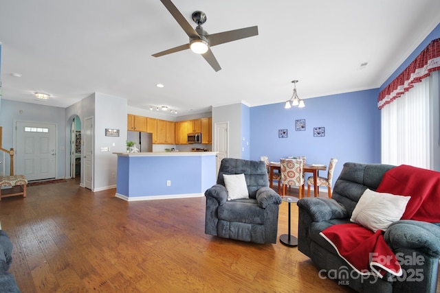 635 Brickdust Ct, Fort Mill, SC 29708 - living room featuring a ceiling fan, dark wood-style floors, arched walkways, and recessed lighting