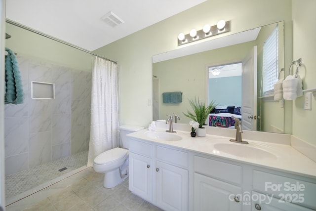 635 Brickdust Ct, Fort Mill, SC 29708 - ensuite bathroom with double vanity, tiled shower, and tile patterned flooring