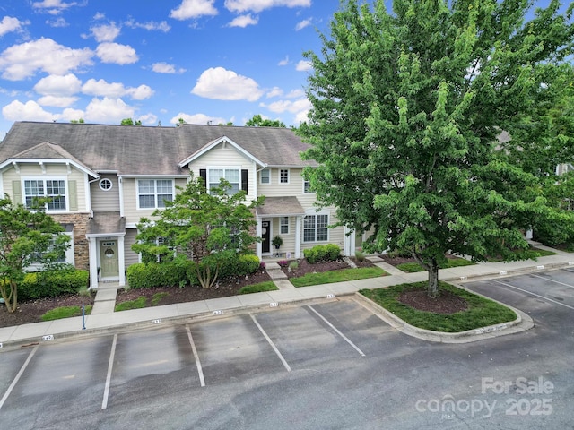 635 Brickdust Ct, Fort Mill, SC 29708 - view of front facade featuring uncovered parking and stone siding