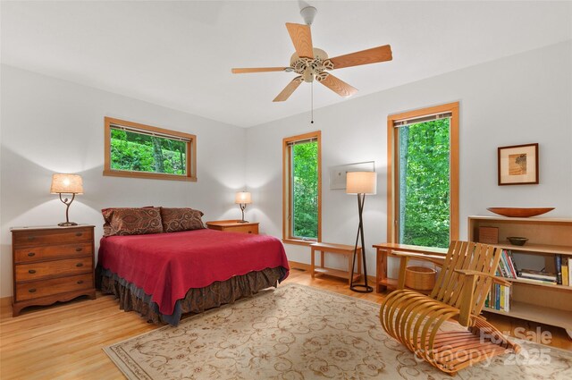 608 Brandywine Rd, Waynesville, NC 28786 - bedroom with wood finished floors and a ceiling fan