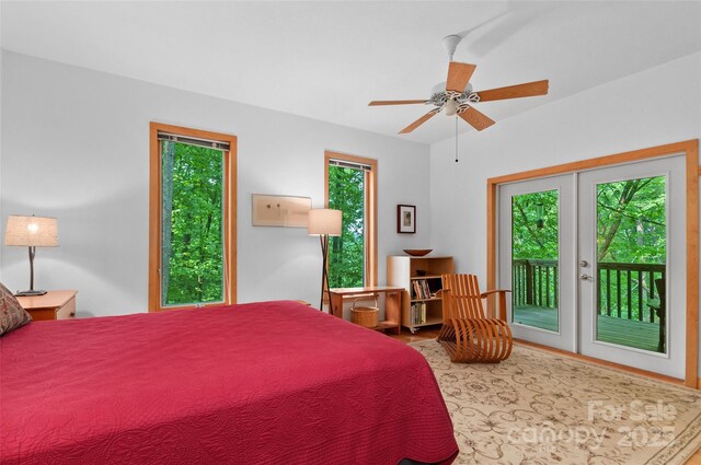 608 Brandywine Rd, Waynesville, NC 28786 - bedroom with access to exterior, wood finished floors, and a ceiling fan