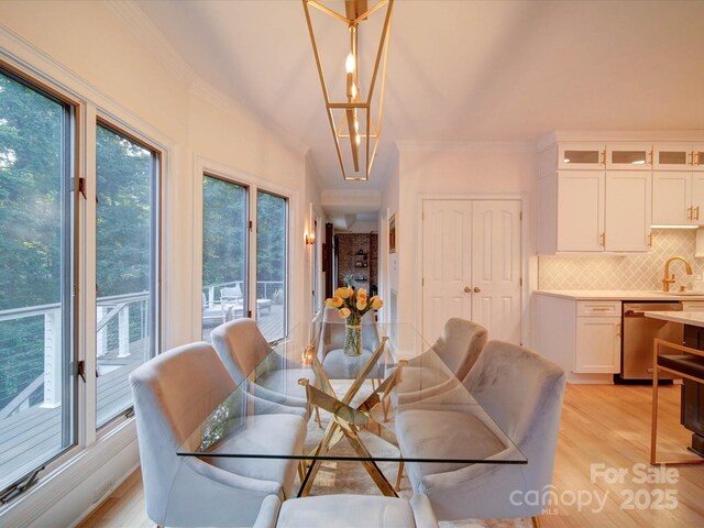 15708 Eagleview Dr, Charlotte, NC 28278 - dining space featuring ornamental molding and light wood-type flooring