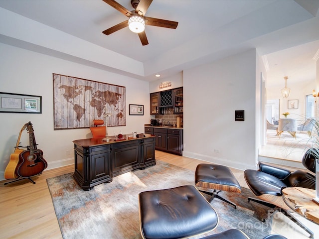 15708 Eagleview Dr, Charlotte, NC 28278 - office featuring bar with sink, light wood-style floors, a ceiling fan, baseboards, and recessed lighting