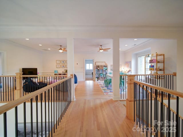 15708 Eagleview Dr, Charlotte, NC 28278 - corridor featuring an upstairs landing, light wood finished floors, healthy amount of natural light, crown molding, and recessed lighting