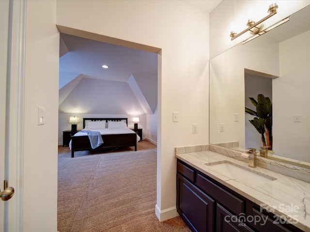 15708 Eagleview Dr, Charlotte, NC 28278 - ensuite bathroom with vanity, lofted ceiling, and baseboards