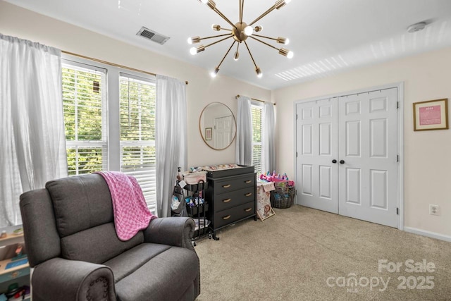 7881 Mariners Pointe Cir, Denver, NC 28037 - sitting room featuring a chandelier and light colored carpet