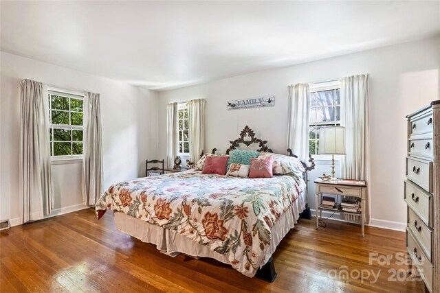 6434 Sardis Rd, Charlotte, NC 28270 - bedroom featuring wood finished floors and baseboards