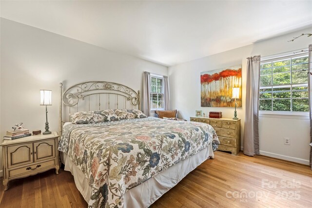 6434 Sardis Rd, Charlotte, NC 28270 - bedroom featuring wood finished floors and baseboards