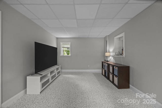 110 Spring Path, Hendersonville, NC 28739 - unfurnished living room featuring a paneled ceiling and baseboards