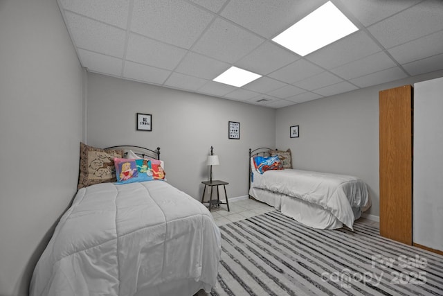 110 Spring Path, Hendersonville, NC 28739 - bedroom with a paneled ceiling, tile patterned flooring, and baseboards