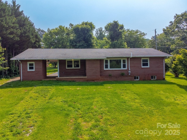 191 Rolling Green Dr, Sylva, NC 28779 - ranch-style house with a front lawn and brick siding