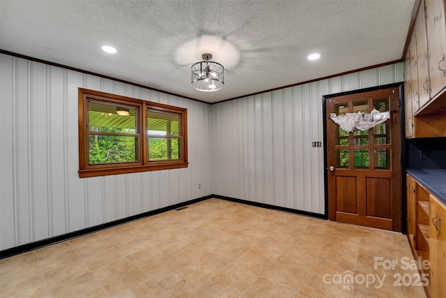 191 Rolling Green Dr, Sylva, NC 28779 - spare room with ornamental molding, recessed lighting, and a textured ceiling