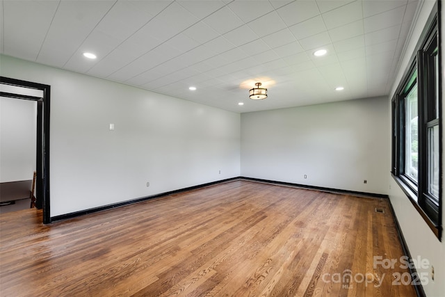 191 Rolling Green Dr, Sylva, NC 28779 - empty room with light wood-style flooring, recessed lighting, and baseboards