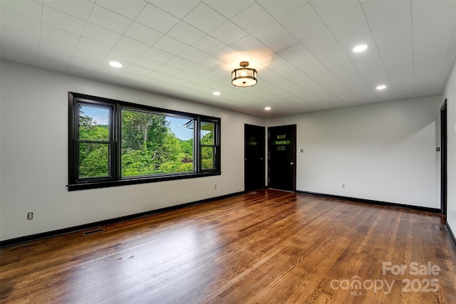 191 Rolling Green Dr, Sylva, NC 28779 - empty room featuring wood finished floors, recessed lighting, and baseboards