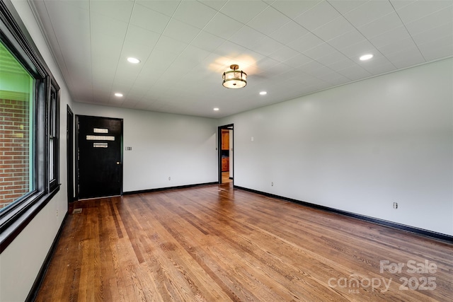 191 Rolling Green Dr, Sylva, NC 28779 - empty room featuring wood finished floors, baseboards, and recessed lighting