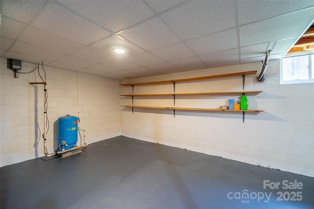 191 Rolling Green Dr, Sylva, NC 28779 - basement with a water pressure tank, concrete block wall, and a drop ceiling