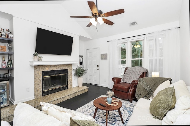 433 W 8th St Unit 66, Charlotte, NC 28202 - living room with ceiling fan, vaulted ceiling, a high end fireplace, and baseboards