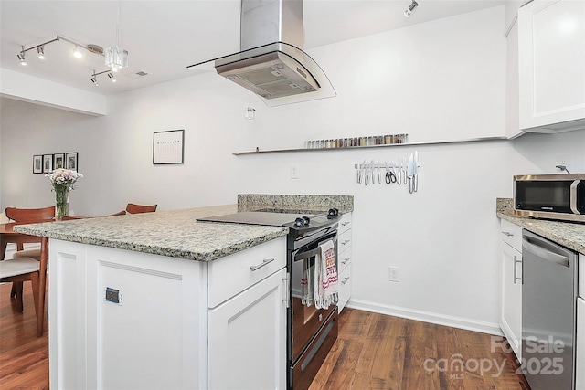 433 W 8th St Unit 66, Charlotte, NC 28202 - kitchen featuring stainless steel appliances, island exhaust hood, dark wood-style flooring, a peninsula, and white cabinetry