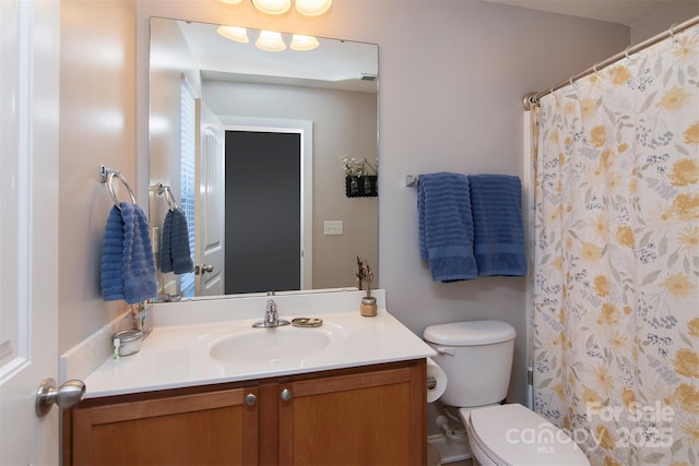 15907 Rose Glenn Ln, Davidson, NC 28036 - bathroom with vanity, toilet, and a shower with shower curtain