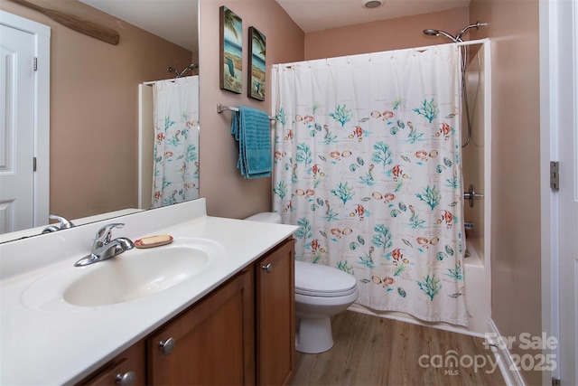 15907 Rose Glenn Ln, Davidson, NC 28036 - bathroom featuring vanity, wood finished floors, toilet, and shower / bath combo