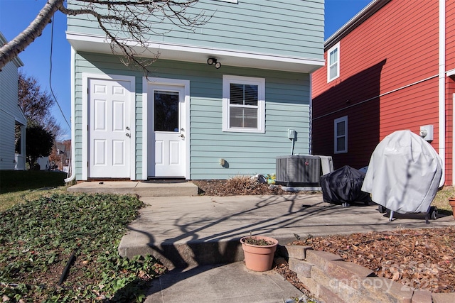 15907 Rose Glenn Ln, Davidson, NC 28036 - entrance to property with central AC unit and a patio