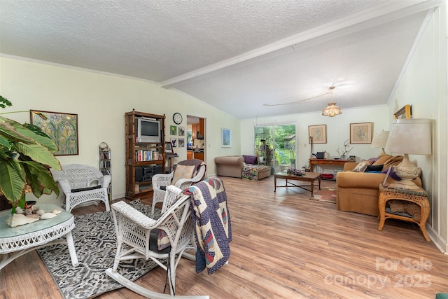 38 Hidden Forest Dr, Hendersonville, NC 28792 - living room featuring light wood-style floors, a textured ceiling, and crown molding