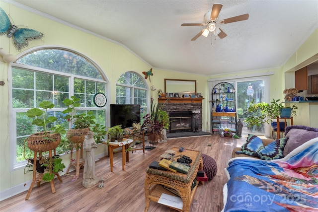 38 Hidden Forest Dr, Hendersonville, NC 28792 - living room with lofted ceiling, a ceiling fan, crown molding, healthy amount of natural light, and a textured ceiling