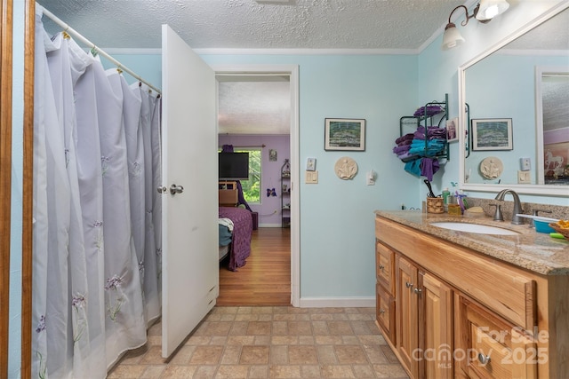 38 Hidden Forest Dr, Hendersonville, NC 28792 - full bathroom with ensuite bath, vanity, a textured ceiling, stone finish flooring, and a shower with curtain