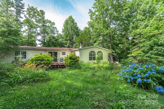 38 Hidden Forest Dr, Hendersonville, NC 28792 - back of property featuring a deck