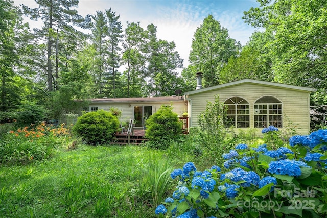 38 Hidden Forest Dr, Hendersonville, NC 28792 - rear view of house featuring a wooden deck