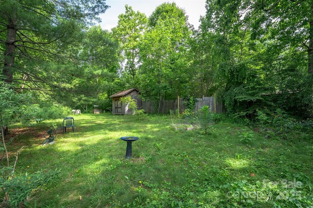 38 Hidden Forest Dr, Hendersonville, NC 28792 - view of yard featuring a storage shed